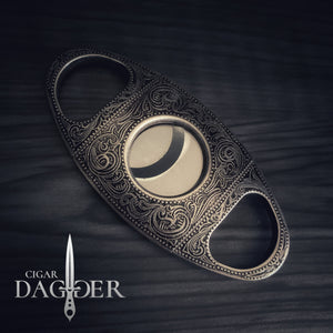 cigar cutter in antique silver finish with engraved design