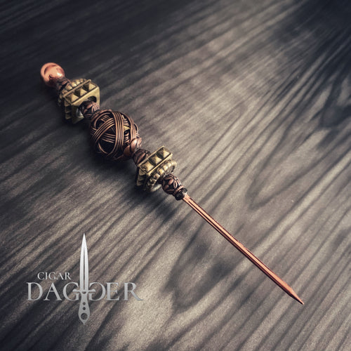 steampunk cigar pick in copper and brass tones with detailed jewelry elements