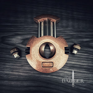 The Orbit V Cut Cigar Cutter With Punch in Copper