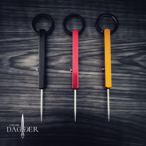 The Next Gen Retractable Titanium Pocket Cigar Dagger Nubber in Red | Gold | Black