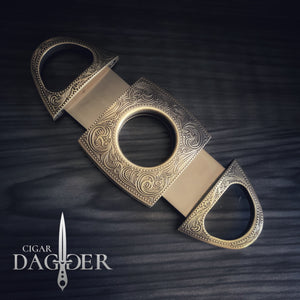 cigar cutter in antique brass with engraved design extended view