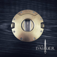 Load image into Gallery viewer, The Orbit V Cut Cigar Cutter With Punch in Brass