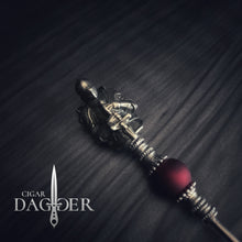 Load image into Gallery viewer, the red knight cigar saver with silver toned jewelry elements and beads angled close up